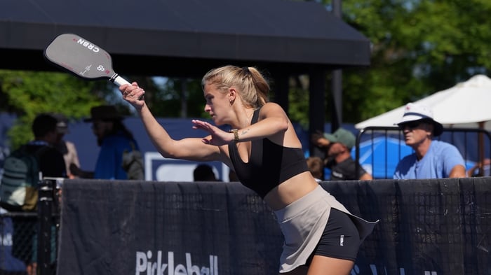 Hannah Blatt in mid pickleball hit