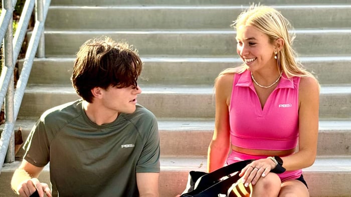 Two players discussing pickleball