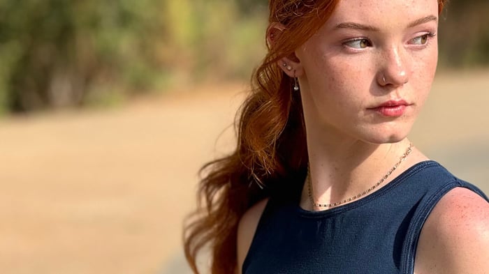 Pickleball player looking to the right during a match
