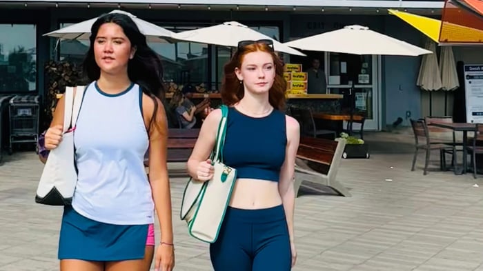 Two women wearing spring pickleball gear