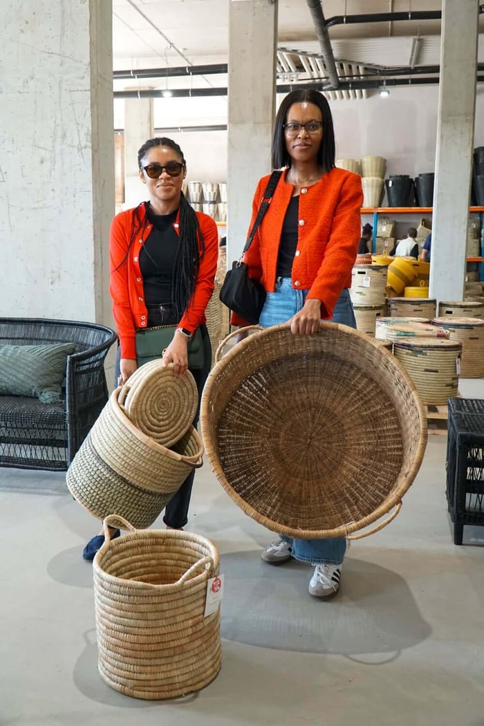 Guests enjoying the Basket and Beauty Experience at the Durban Factory Sale while exploring handcrafted homeware by Mo's Crib.