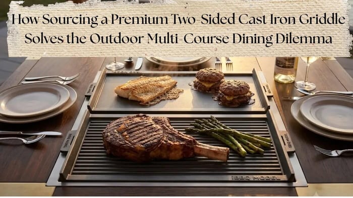 A high-end outdoor grill table setup on a Traverse City patio shows a premium iBBQ Angara table with a seamless, two-sided cast iron griddle searing whitefish and steak at sunset, illustrating its dual cooking surfaces for luxurious open air entertai