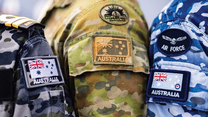 adf soldiers presenting patches