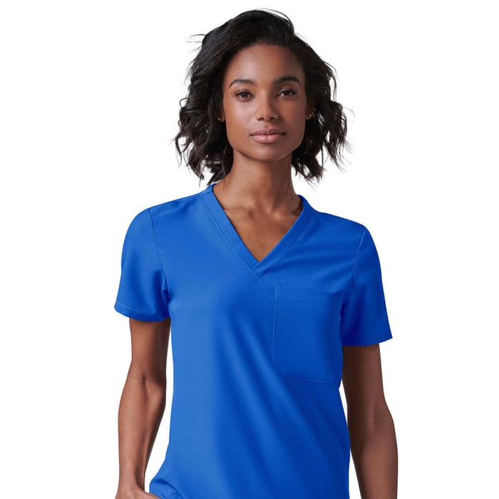 Woman wearing Royal Blue MedTailor custom scrubs