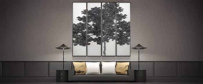 Minimalistic interior featuring a triptych tree silk art in monochrome.