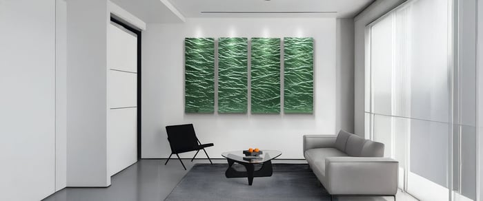 Minimalist living room with four-panel green 3D wall office art resembling water ripples, paired with sleek furniture and glass walls.