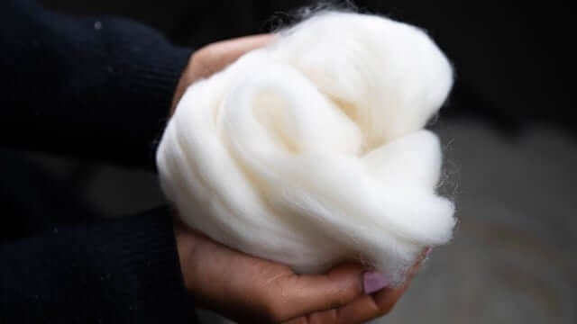 Hypoallergenic wool comforter for people with down feather allergies and sensitive skin.