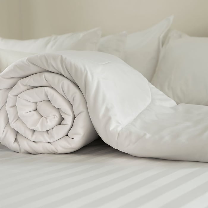 Bamboo Comforter vs Down: Why Both Trap Heat