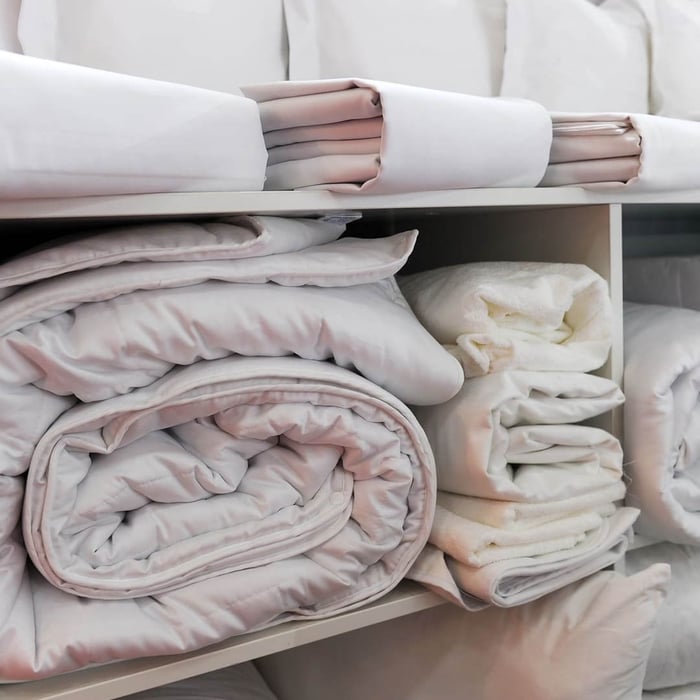 Wool vs Down Comforter: Why Down Causes 3 AM Sweats