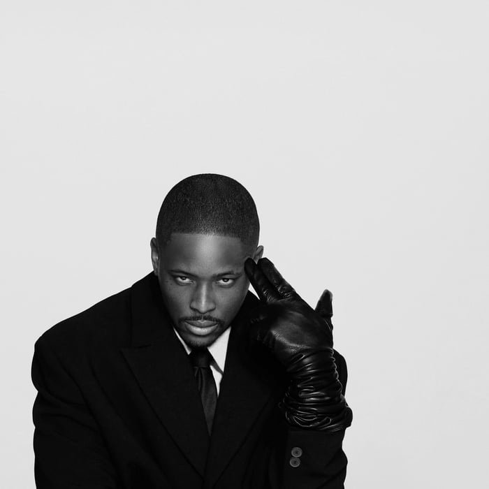 YG Gentlemen’s Club Album Review: A Suit, a Smile, and a Loaded Gun