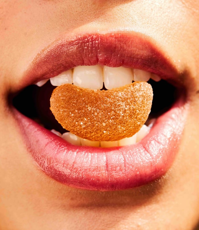 Valentine's Day gifts CBD Gummy fruit slice in mouth