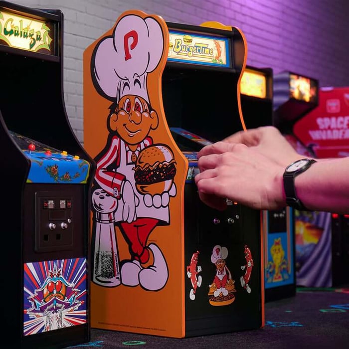 The distinctive appearance of quarter arcade machines available from Just Geek