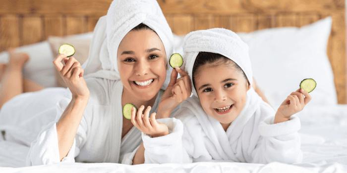 family using diy natural skin care recipes during a relaxing spa day with homemade masks and scrubs
