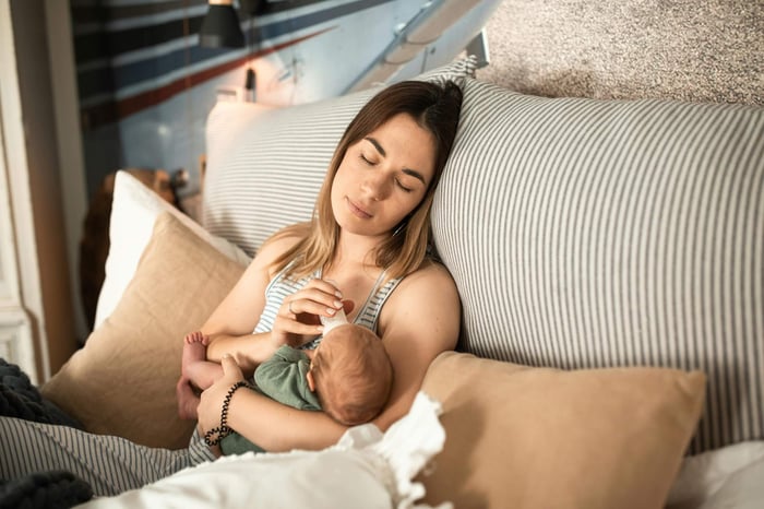 mom caring for baby after therapy for postpartum intrusive thoughts