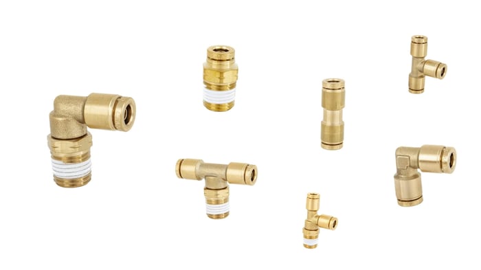 Collage of brass DOT metal push-to-connect PT-series fittings in various configurations — straight connectors, elbows, tees, unions, and bulkhead unions