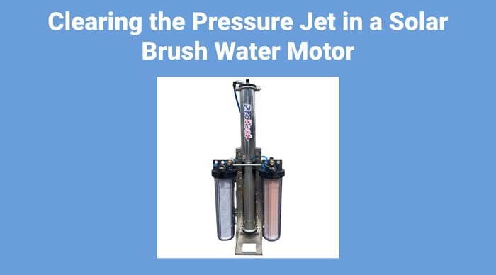 Clearing the Pressure Jet in a Solar Brush Water Motor
