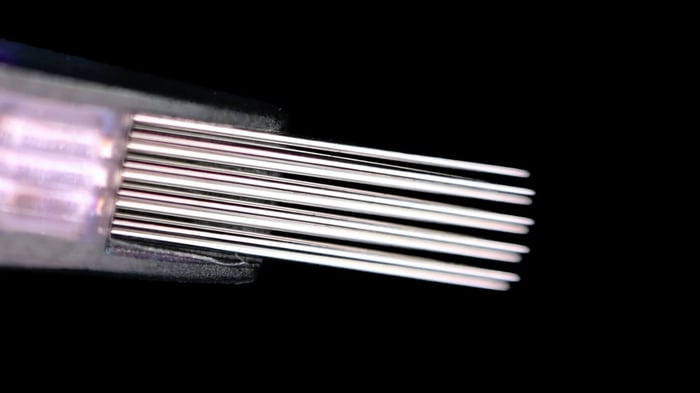 Close-up of Japanese surgical stainless steel tattoo needles made from 304 medical-grade steel by XACTbodyart.