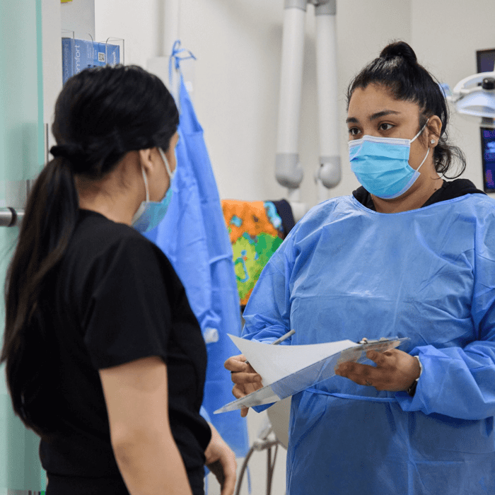 Two woman talking to each other