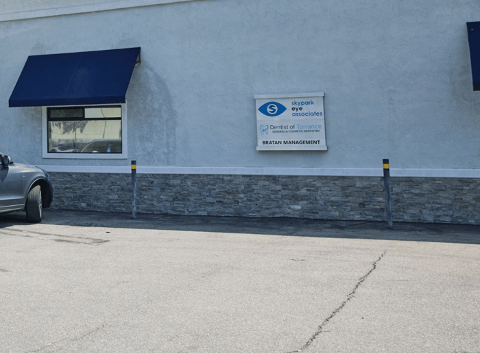 A parking lot of a dental clinic