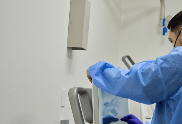 A person looking at a monitor