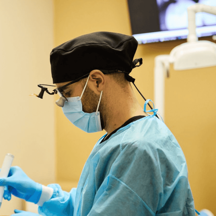 A dentist talking to a patient