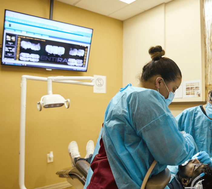A person wearing a face mask and a gloves