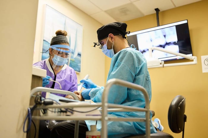 Two dental person standing