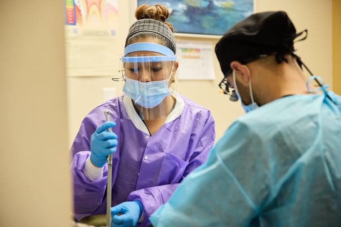Two dental person standing