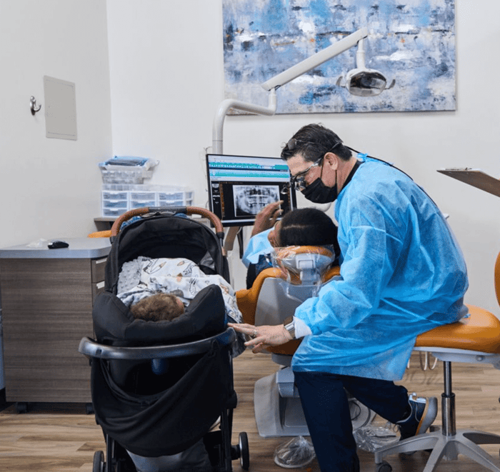 A person talking to a child