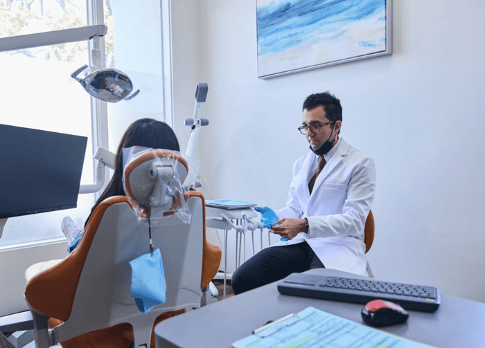 A person talking to a patient