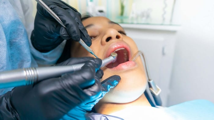 Child attending a first dentist visit at a dental clinic