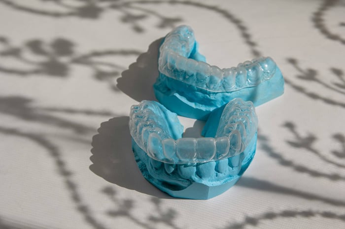Two invisalign on a blue mold
