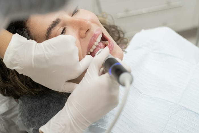 A woman getting her teeth checked