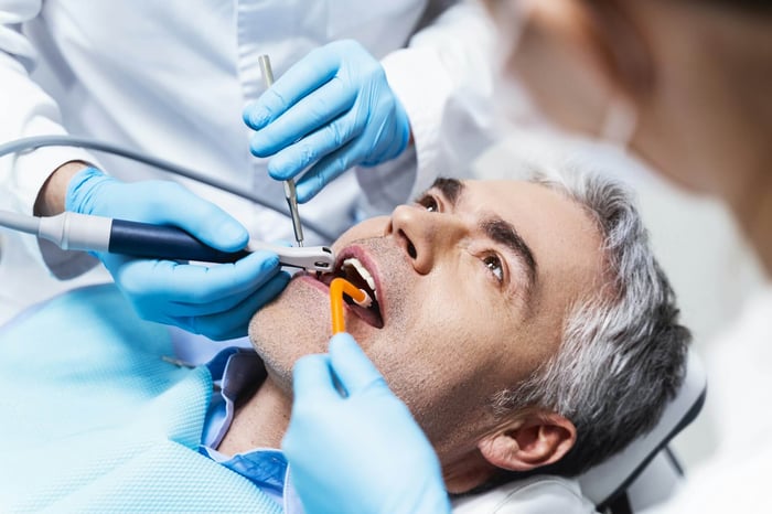 A person on a dental chair