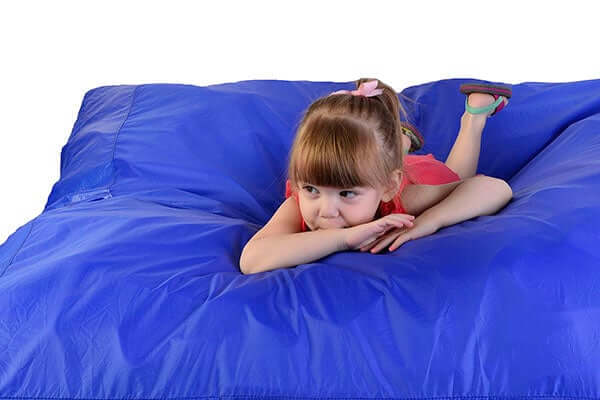 How Do Heavy Work and Crash Pads Benefit Children with Sensory Processing Disorders?