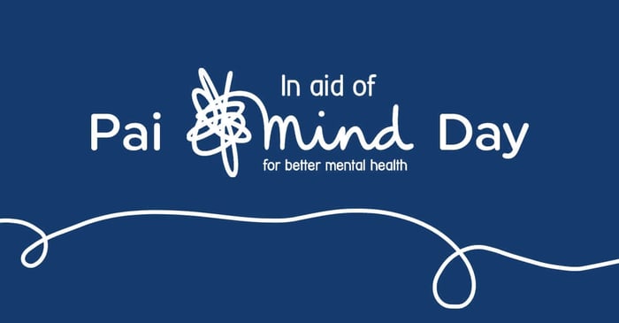 Pai Mind Day logo on blue background - in aid of mental health charity with decorative white line illustration