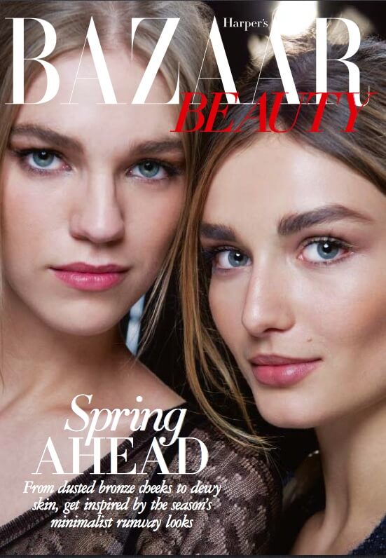 Harper's Bazaar Beauty magazine cover featuring two models with natural makeup and healthy glowing skin