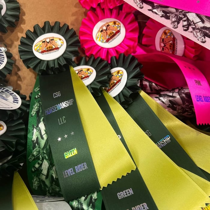 Custom rosette awards in your choice of ribbon color or ribbon design, print color, custom text, and center design