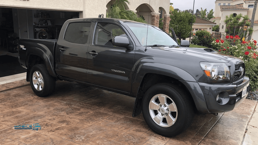 A Toyota Tacoma truck in a San Diego driveway after professional truck detailing