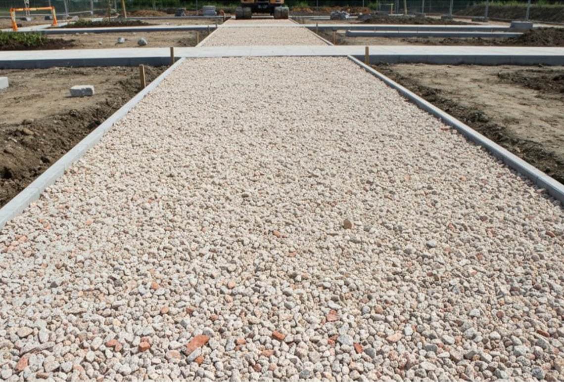 Crush old concrete, brick, or ceramics for sub-base and landscaping