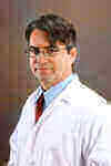 Dr. Hector Valenzuela, Chief Science Officer reviewing TA-65 research data