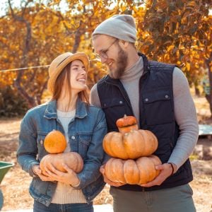 Fall Harvest with Smiling Couple