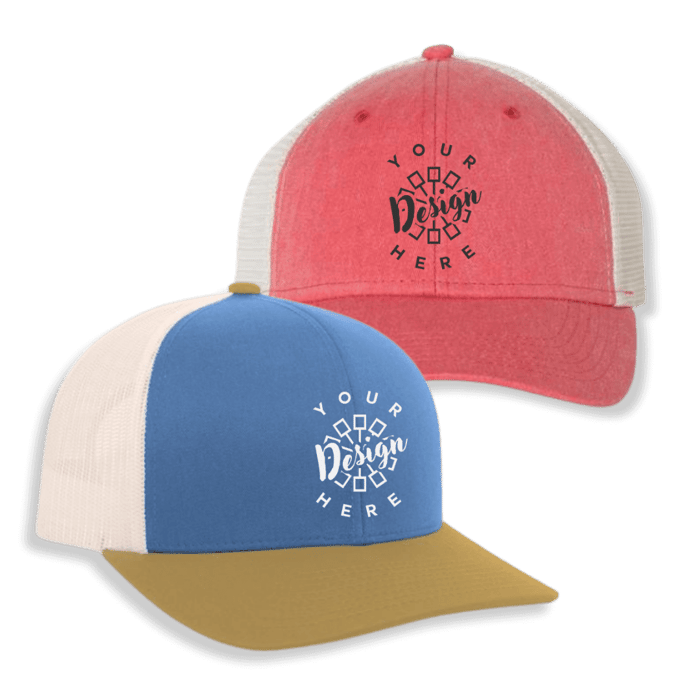 Two custom trucker hats one blue and one pink, both with the "your design here" logo on them