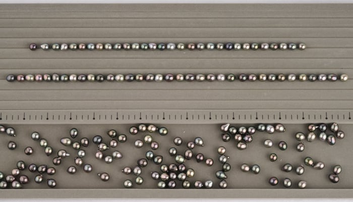 Then line the pearls up to make sure they flow just right