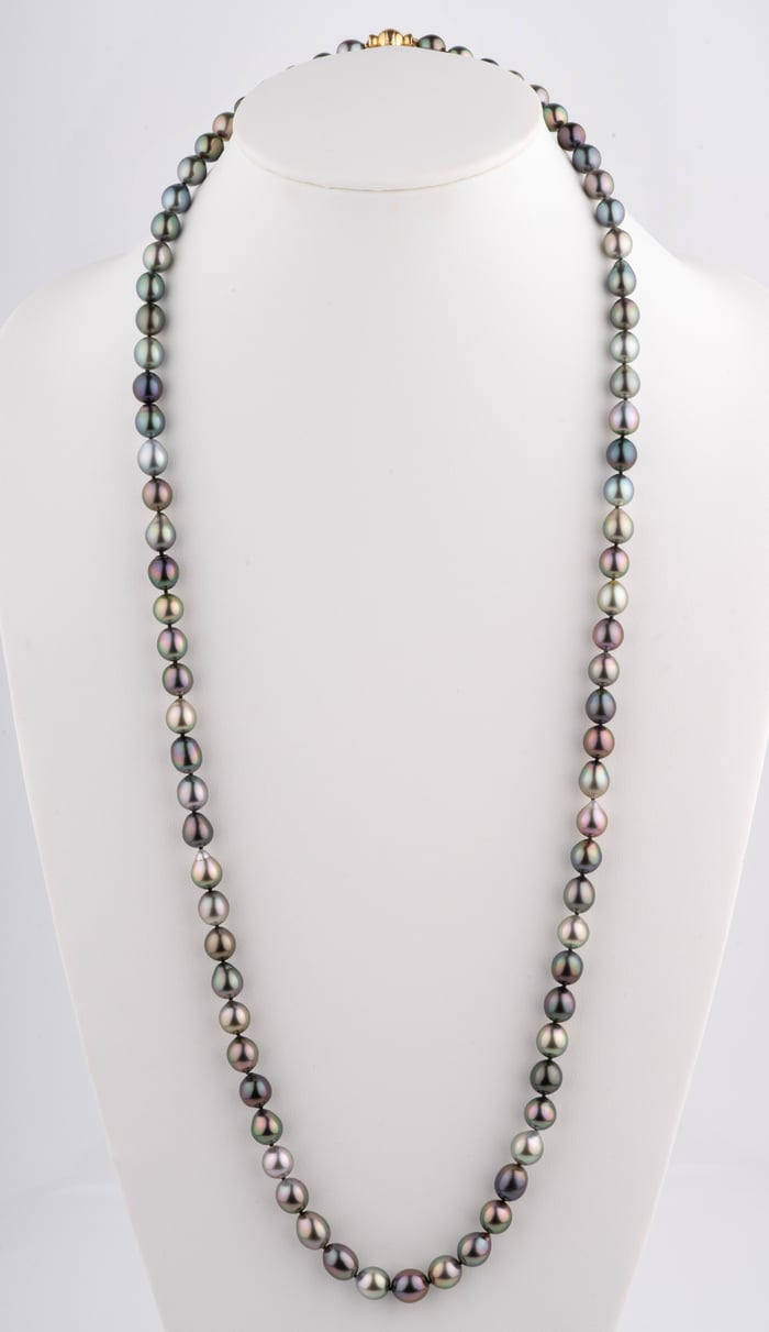 Worn long with a perfect center pearl ... Tahitian Pearlfection