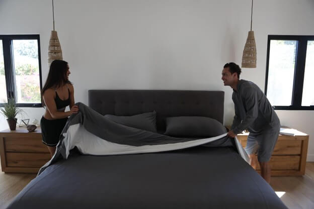 Woman Making Her Sheex Peformance Bed