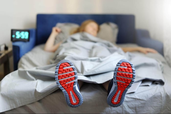 Athlete Being Lazy in Bed that Didn't Have a Good Night Sleep With the Right Sleep Products