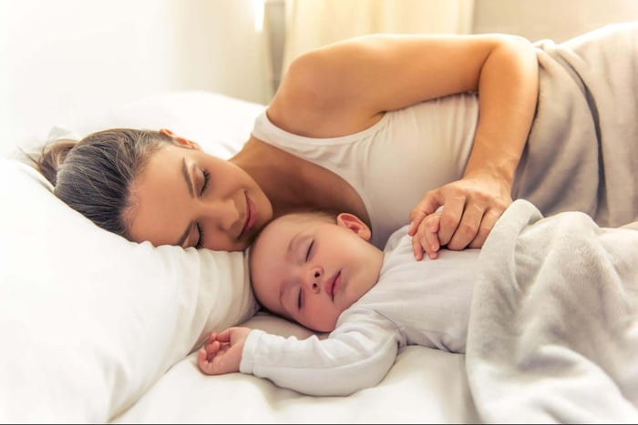 Mother and Baby Sleeping Together in the SHEEX Temperature Regulating Sheets