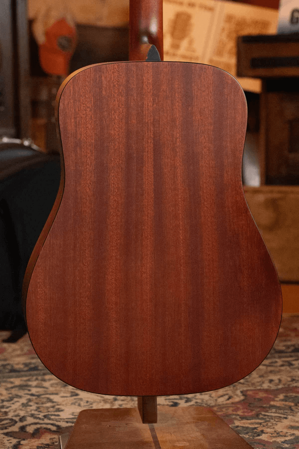 solid vs laminate acoustic guitars