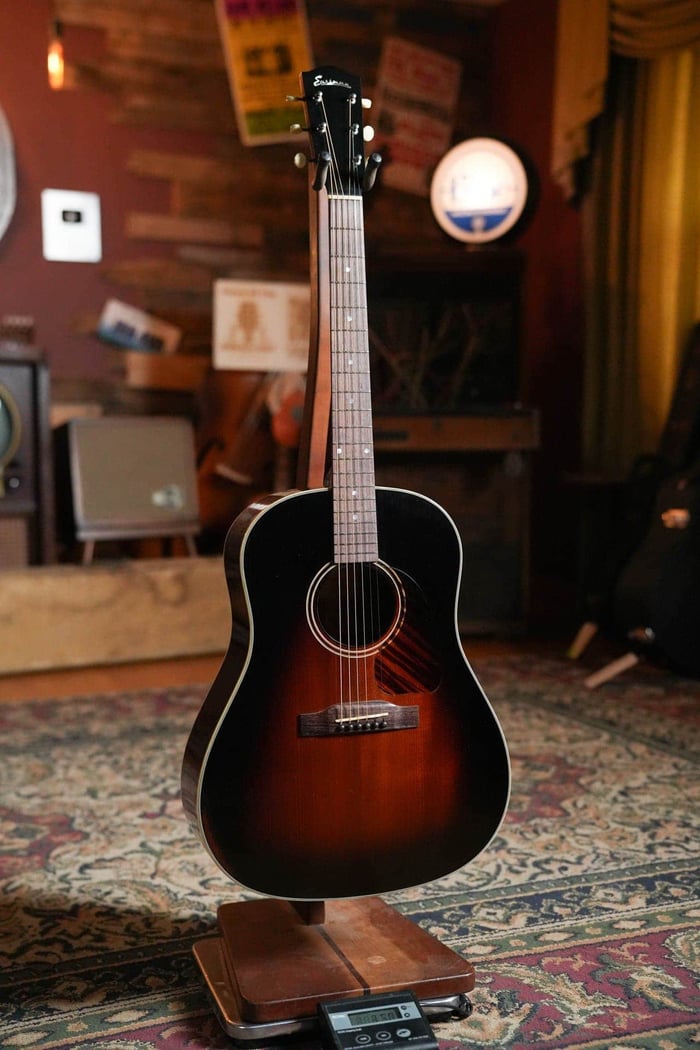 Eastman E15SS/V-SB slope shoulder guitar in Antique Sunburst varnish on a stand in The Acoustic Shoppe showroom